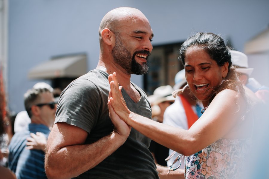 A couple dancing salsa in the streets of Old San Juan, Puerto Rico
