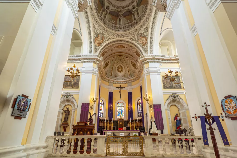 A sweeping landscape picture of the alter at the Catedral de San Juan in Old San Juan, Puerto Rico.
