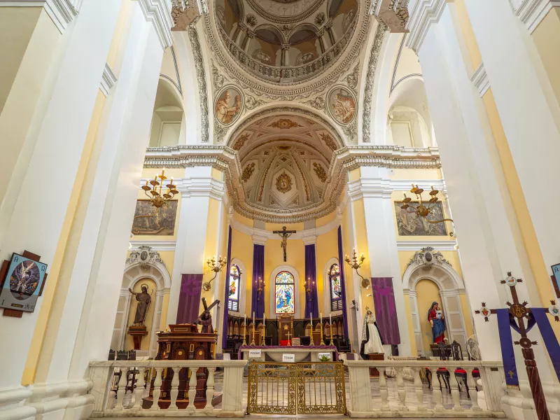 A sweeping landscape picture of the alter at the Catedral de San Juan in Old San Juan, Puerto Rico.