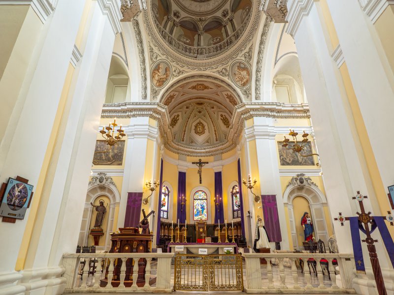 A sweeping landscape picture of the alter at the Catedral de San Juan in Old San Juan, Puerto Rico.